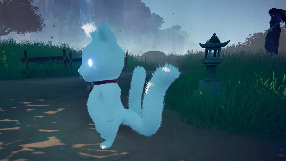 Yoru, the Nekomata, beside a stone lantern
